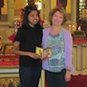 Photo of Bishop Mark with Fr. Edward and family