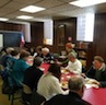 Photo of parish and veterans enjoying a breakfast honoring local veterans