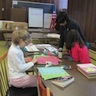 Photo of some of the youth of our parish making Valentine's Day cards for residents of Serenity Gardens nursing home