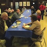 Photo of parishioners and guests enjoying food and fellowship